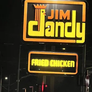 a neon sign for tim dandy