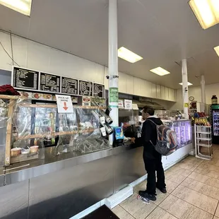 a man standing at the counter