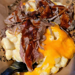 Loaded Mac &apos;N Cheese with pulled pork. $9. BBQ sauce applied at the condiment bar.