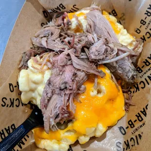 Loaded Mac &apos;N Cheese with pulled pork. $9.