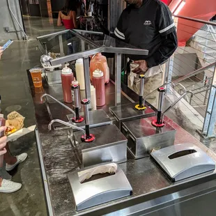 Condiments bar near Jim &apos;N Nick&apos;s behind Section 116.