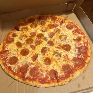 a pepperoni pizza in a box