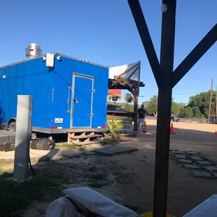 The back of the blue food truck.