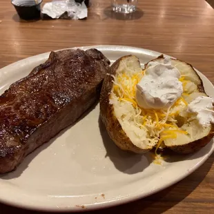 14 ounce KC strip and baked potato