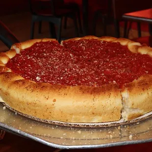 Jimano&apos;s specializes in iconic Chicago deep-dish pizzas - a hearty affair with a one-inch-thick crust baked in a pan.