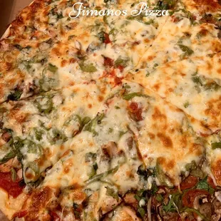 Thin Crust Supreme Pizza with 1/2 with Chicken... it was Superb