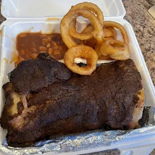 Half Rack of Ribs. Beans. Onion Rings.  Freaking solid BBQ