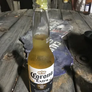 a bottle of beer on a table