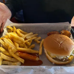 Burger and fries with a few hush puppies.
