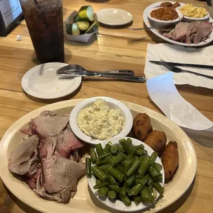 I ordered the Sliced Pork Dinner with Potato Salad, Green Beans, and Hush Puppies.