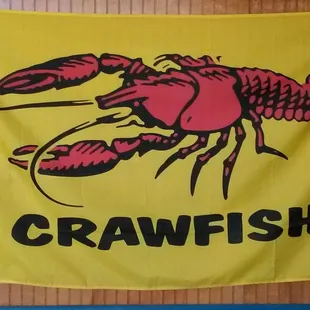 a lobster on a yellow banner