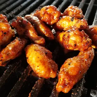 chicken wings on a grill