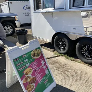 a sign for a food truck