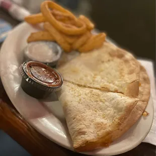 a quesadilla and french fries