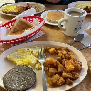 Eggs, toast, sausage, home fries