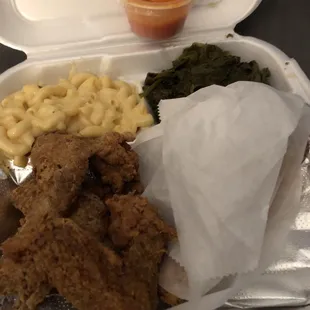 Chicken wings, macaroni, greens