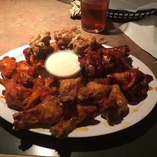 Wings!  4 Flavors here (their homeade spicy ranch, bbq, spicy garlic and honey mustard). Huge drumsticks!