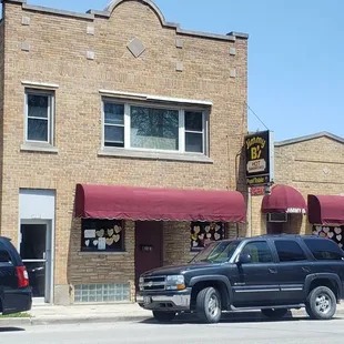 cars parked in front of a building