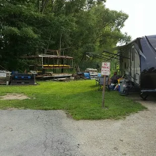 a truck parked in front of a trailer