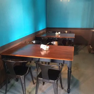 a table and chairs in a restaurant