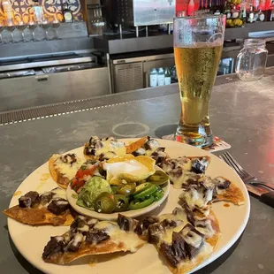 Beef fajita nachos and ice cold bud light.