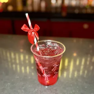 Coquette Christmas Crush - tequila, triple sec, lime, strawberry, watermelon Red Bull