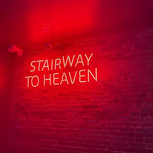 a neon sign that reads stairway to heaven