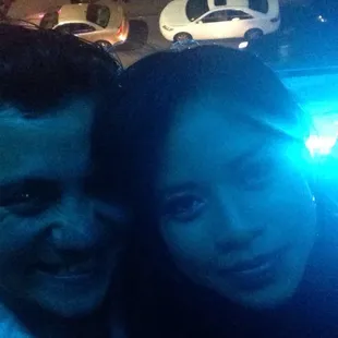 a man and a woman posing for a picture