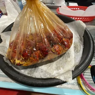 3lb of crawfish (mostly already eaten), 4 potatoes, 1 sausage link