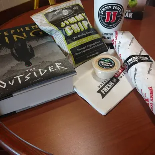 Italian unwich, chips and a drink with a good book!