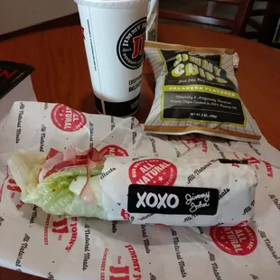 a sandwich and drink on a table