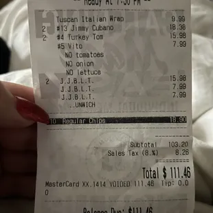 a person holding a receipt