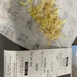 Brown shredded lettuce.