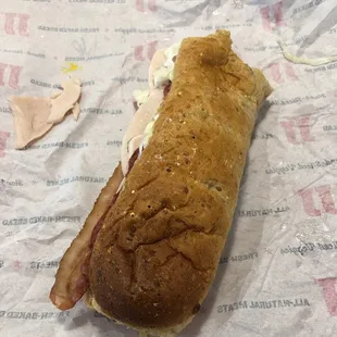 9" sandwiches not cut in half. It was difficult trying to hold it and eat without everything falling out.