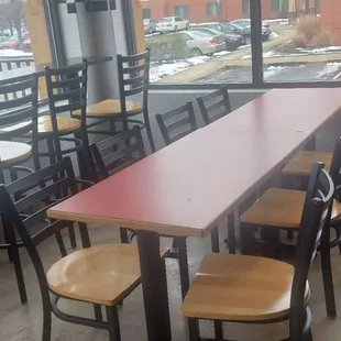 a table and chairs in a restaurant