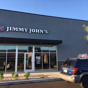 Front of the building and delivery car