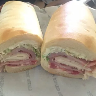 #11 Country Club with turkey, ham, provolone, lettuce, tomato, mayo, and added bacon.