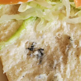 a sandwich with lettuce and tomato