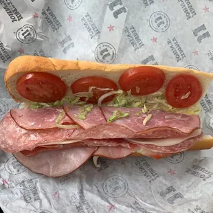 a sub sandwich on a wrapper