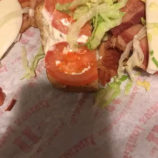 bacon, lettuce, tomato, and cheese sandwich