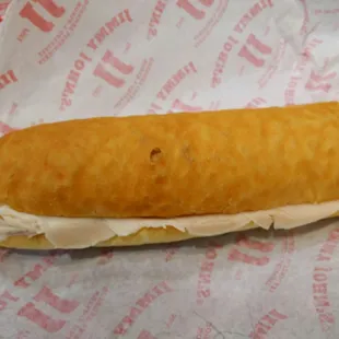 a sub sandwich on a wrapper