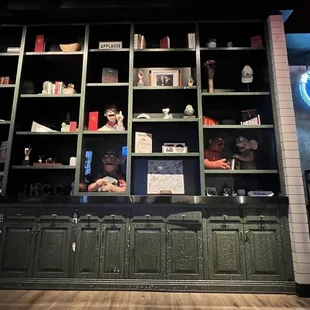 Wall between the bar left and stairs to the right