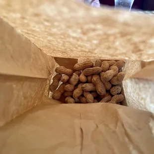 Covid: Peanuts come in a bag now and they bring it to you