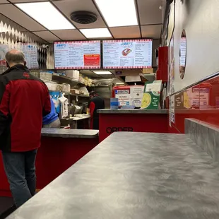 a man standing at the counter