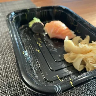 $6 piece of salmon belly. All rice, no fish.