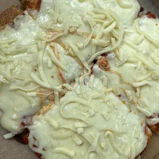 Four cuts with extra cheese!