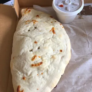 Stromboli with sauce in the side. Excellent, highly recommend it.