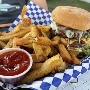 a basket of fries and ketchup