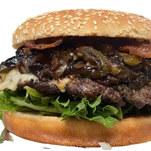 a hamburger with bacon, cheese, onions, and lettuce