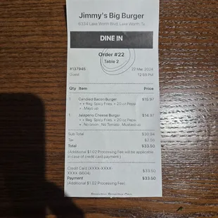 They charge extra for using a credit card. Maybe there was a sign somewhere, but we didn't see it.